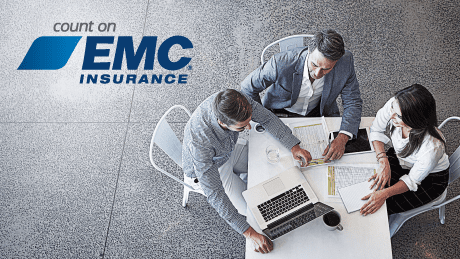 EMC Insurance logo and a group of business people sitting around a table at a meeting.